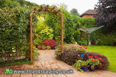 Erected a Wooden Trellis, Laid Paving, Planted Various Shrubbery and Re-Shaped Lawn