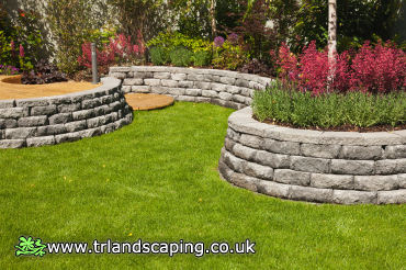 Constructed Brick Shrub Areas and Re-shaped Lawn 