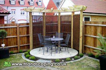 Erected Pergola and Laid Circular Patio Area with Border